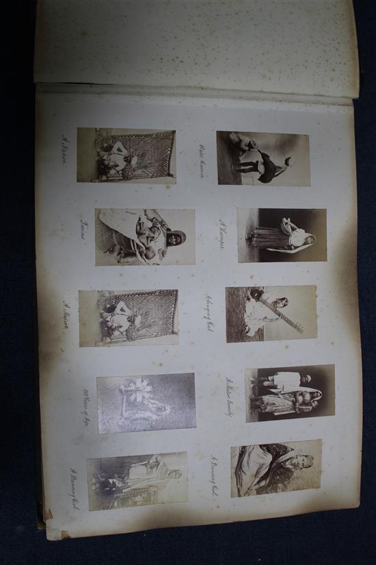 A World Tour photograph album, 17 x 12.5in.
